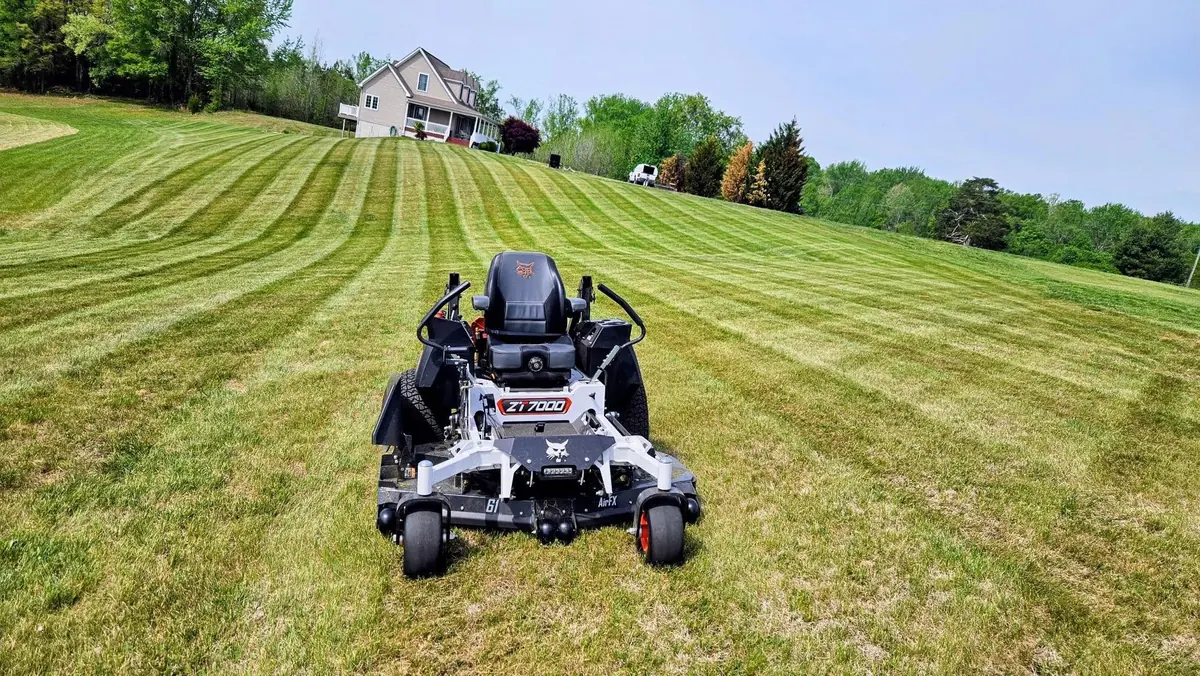 Bobcat ZT7000 zero-turn mower leaving fresh stripes on a large lawn