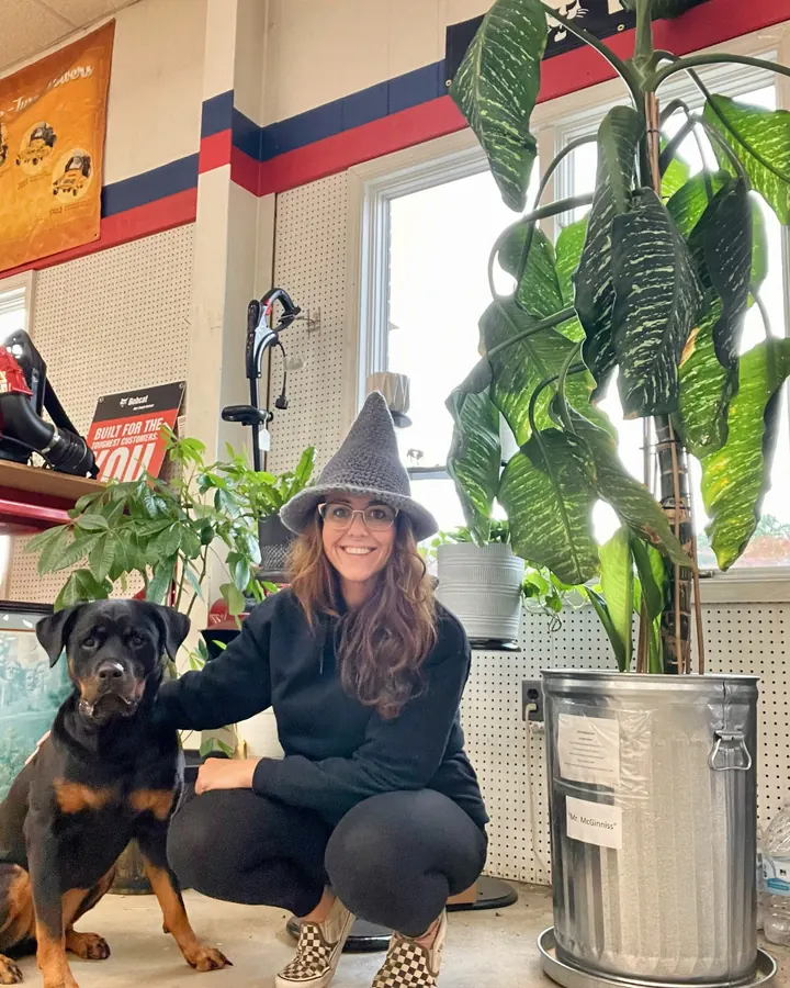 Whitney Crenshaw with her Rottweiler, Millie, at the Gateway shop